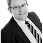 Professionally taken black & white photograph of managing director of CyberSecuritiesUK Rory Breen